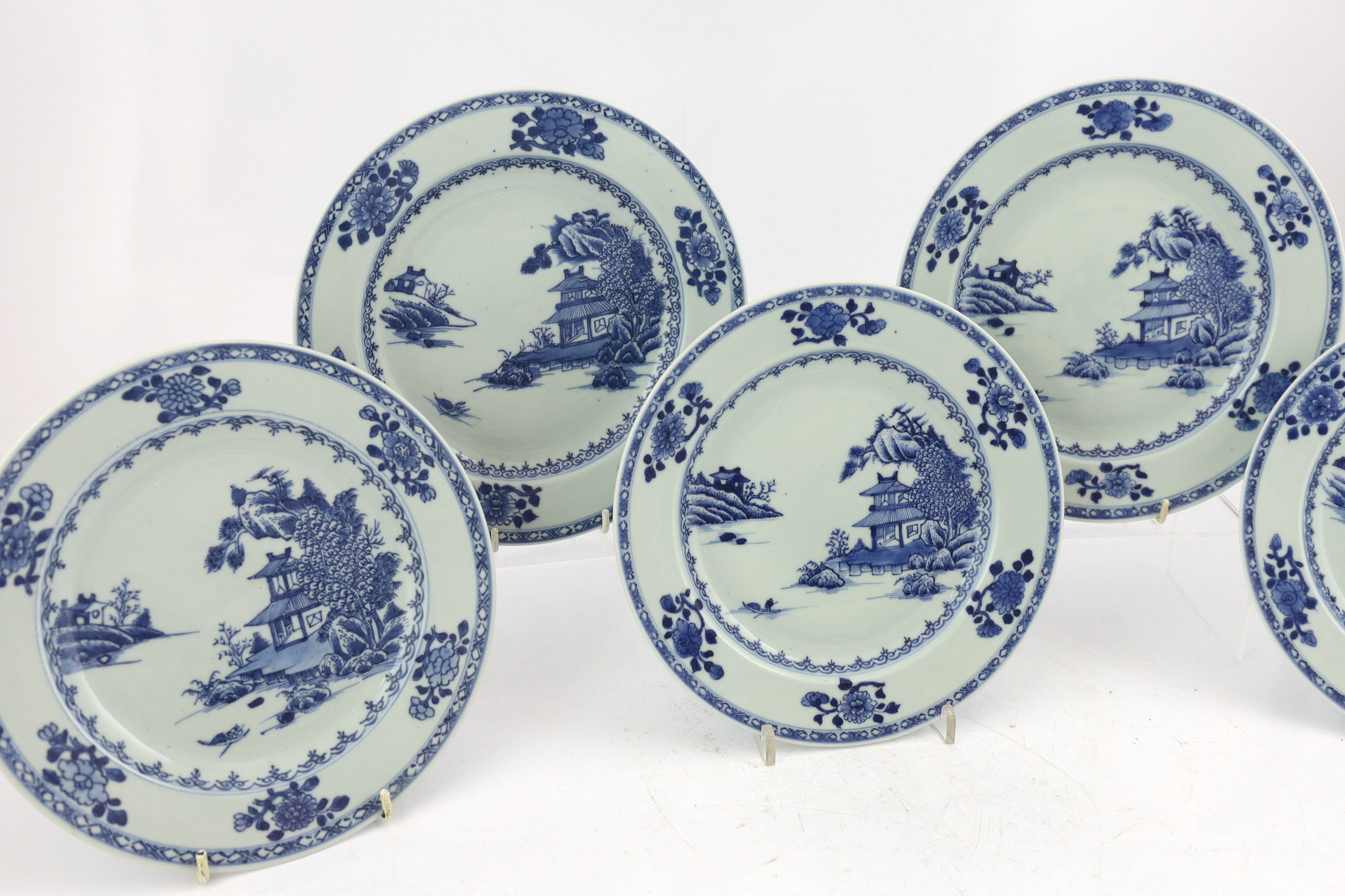 A set of twelve Chinese Nanking Cargo ‘Boatman’ blue and white plates, Qianlong period